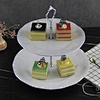 white dessert stands